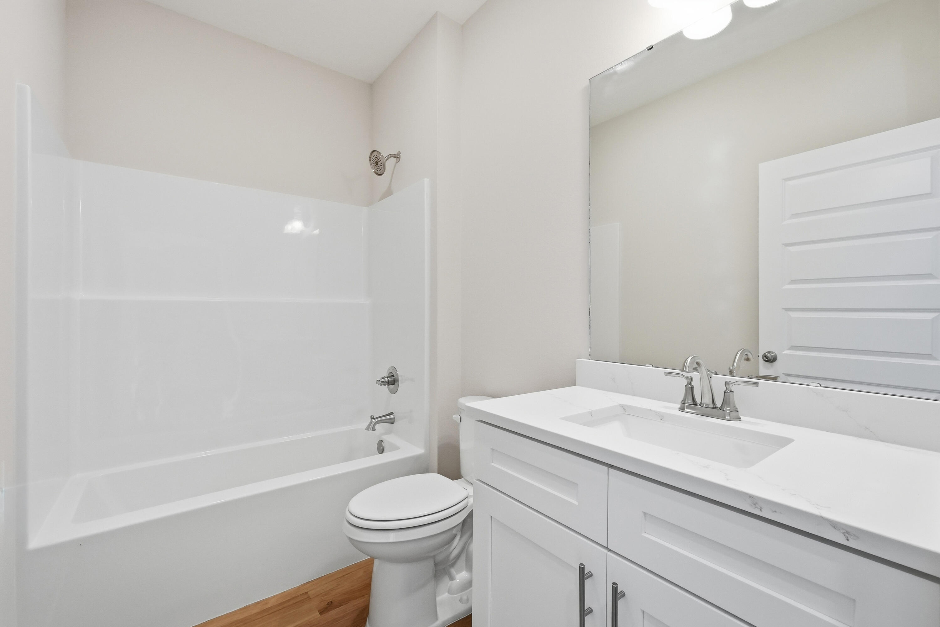 6102 Mildreds Way Crestview, FL 32539 - Photo 19 of 25 a bathroom with a sink a toilet and shower