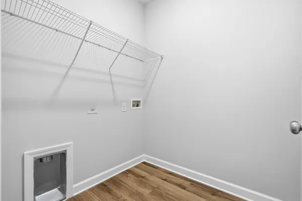 a view of a room with racks on the wall