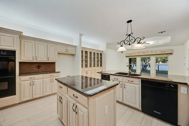 a view of a kitchen with cabinets