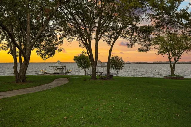 an aerial view of a city and lake view