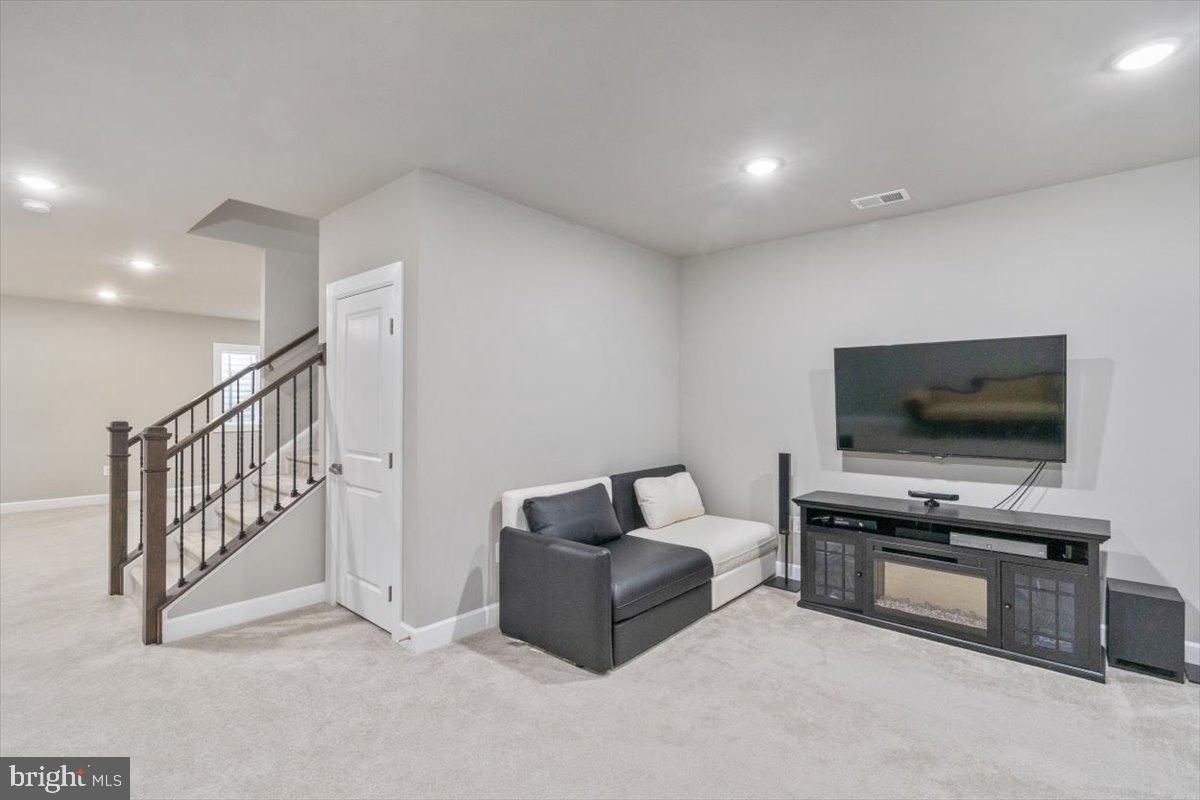 55 Ruthies Way Chalfont, PA 18914 - Photo 46 of 52 Finished basement with media area