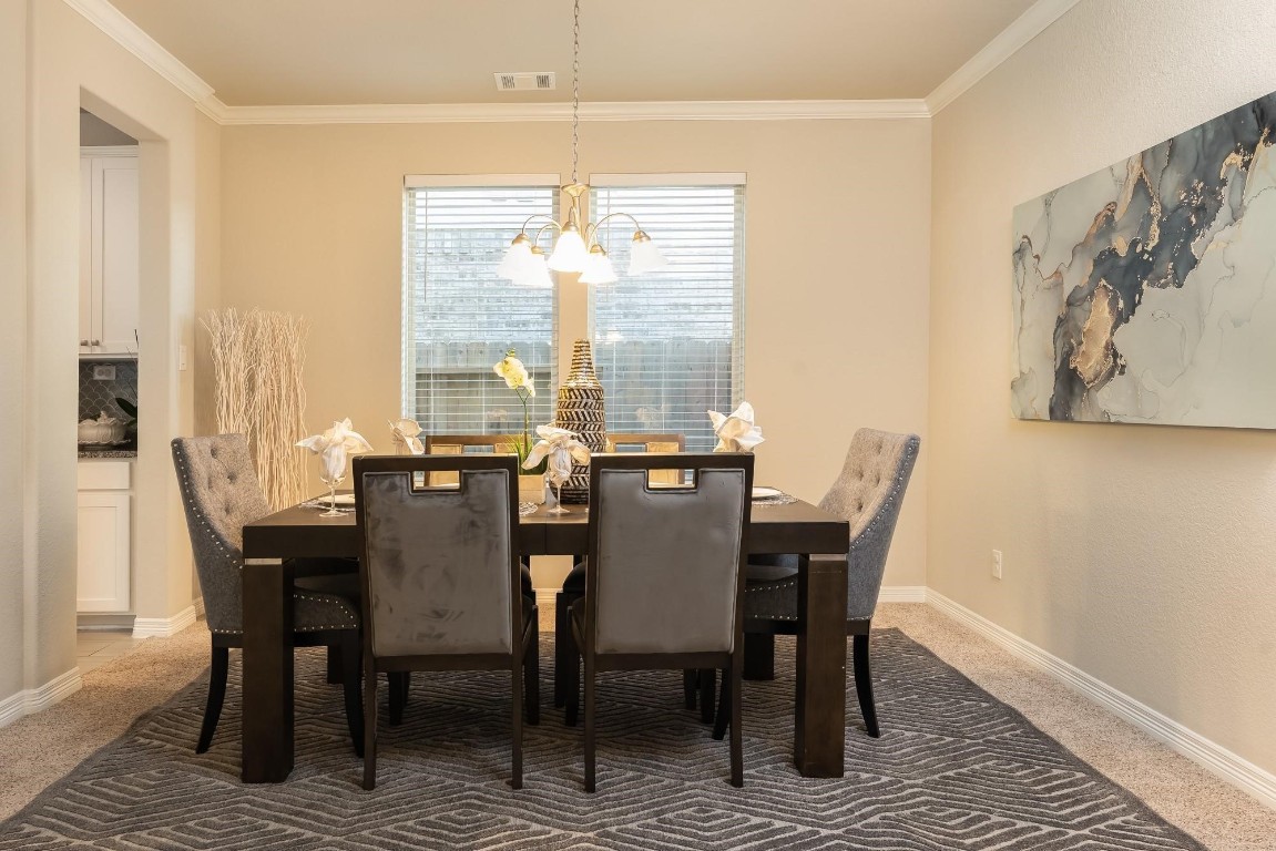 3443 Cabernet Shores Drive Fulshear, TX 77441 - Photo 13 of 27 a view of a dining room with furniture window and outside view