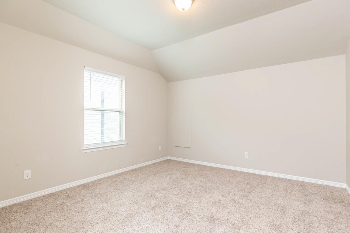 3443 Cabernet Shores Drive Fulshear, TX 77441 - Photo 22 of 27 an empty room with a window