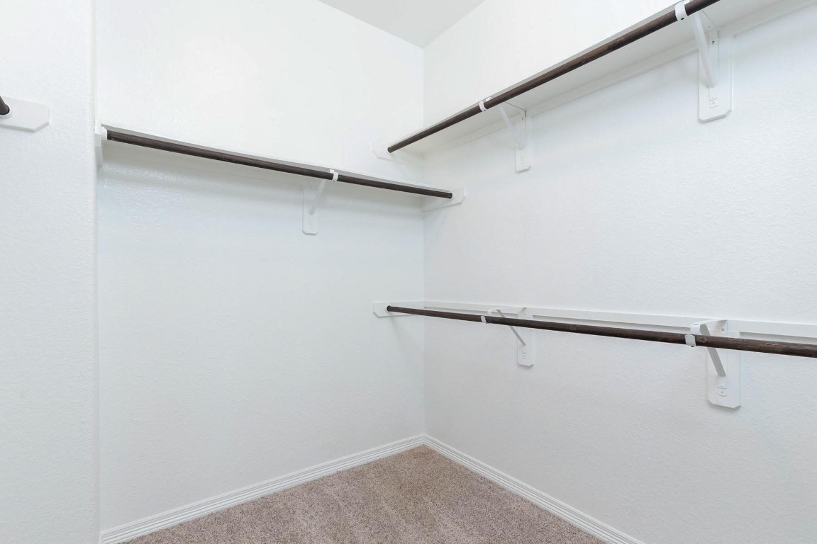 3443 Cabernet Shores Drive Fulshear, TX 77441 - Photo 23 of 27 a view of small space with racks on the wall