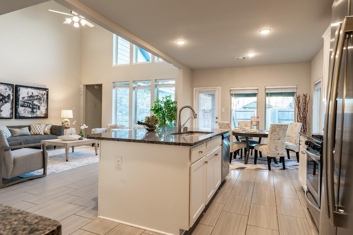 3443 Cabernet Shores Drive Fulshear, TX 77441 - Photo 8 of 27 a view of a living room and dining room
