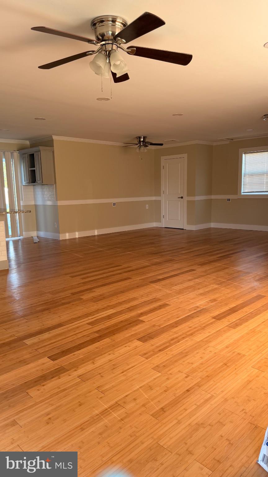 1110 High Street Cambridge, MD 21613 - Photo 2 of 22 Spacious room with warm bamboo floors.