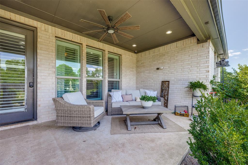 1105 Ranch Drive Bonham, TX 75418 - Photo 22 of 25 Covered patio featuring a ceiling fan, recessed lighting, and brick exterior walls
