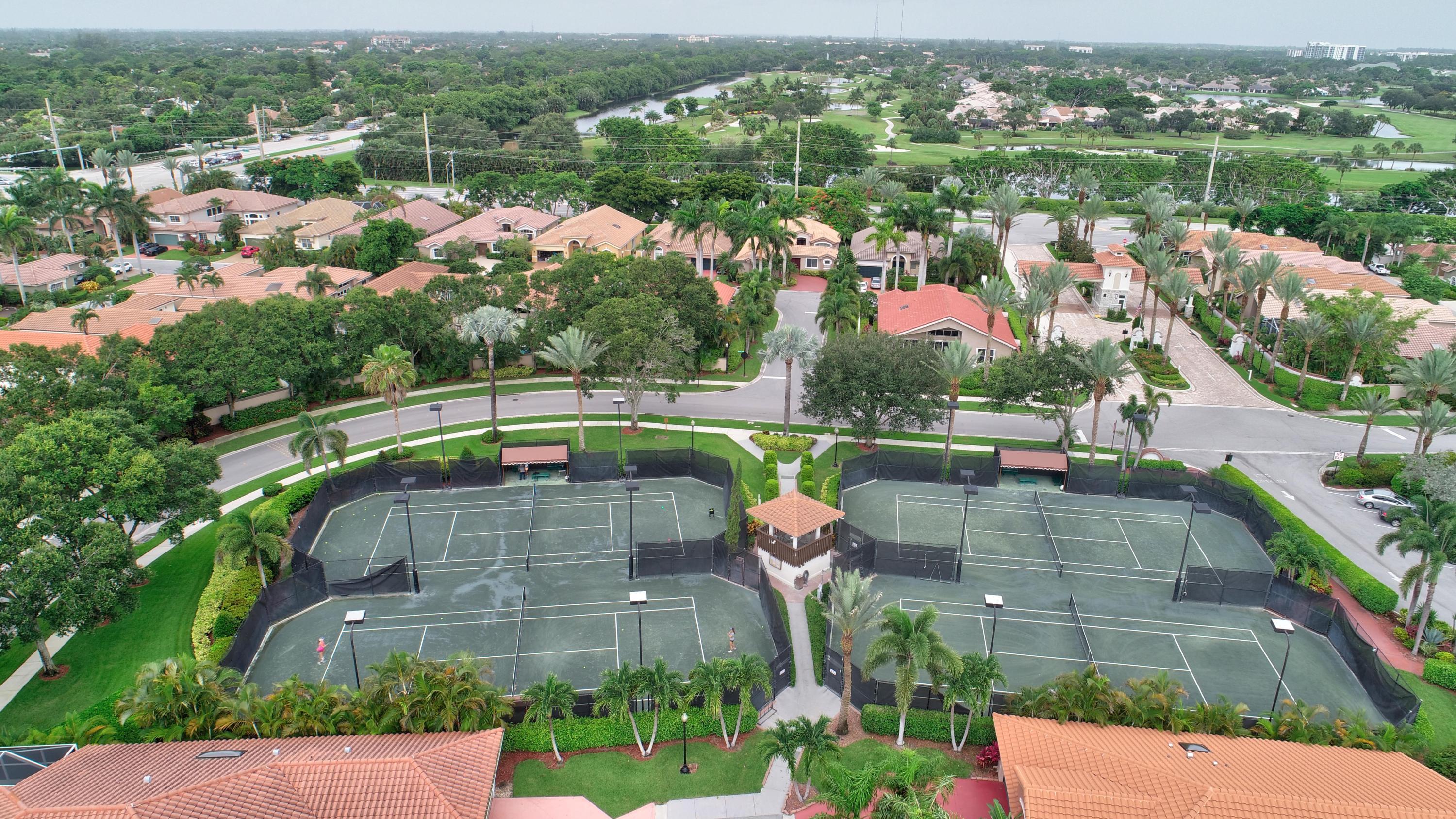 6342 Northwest 23rd Street Boca Raton, FL 33434 - Photo 49 of 50 Night lighted tennis courts