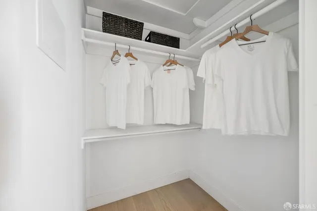 a room with furniture and a mirror