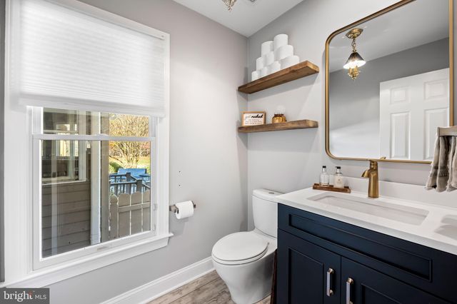 a spacious bedroom with a bed and a couch