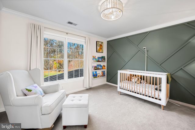 a bed room with a bed and a couch