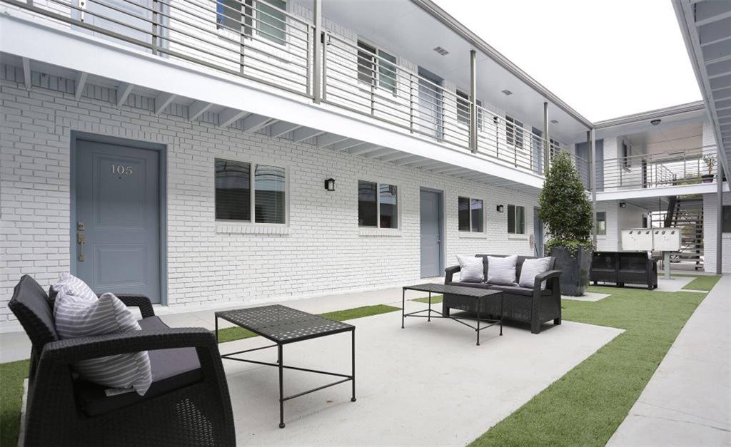 a building outdoor space with patio furniture