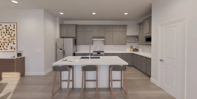 an aerial view of residential houses with outdoor space and swimming pool