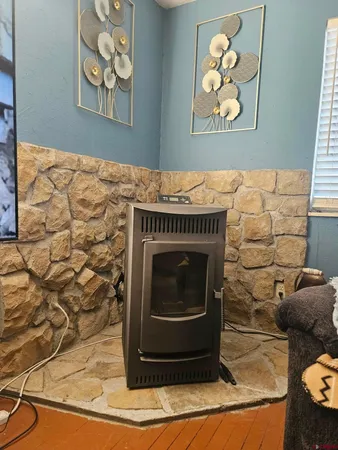 a stove top oven sitting inside of a kitchen
