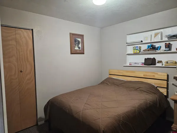 a bathroom with a shower and a door