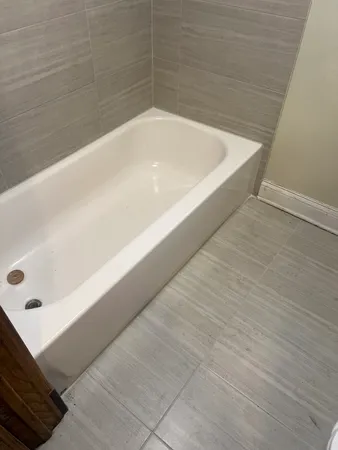 a bathroom with a bathtub