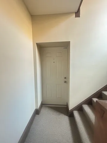 a view of livingroom and kitchen with sink