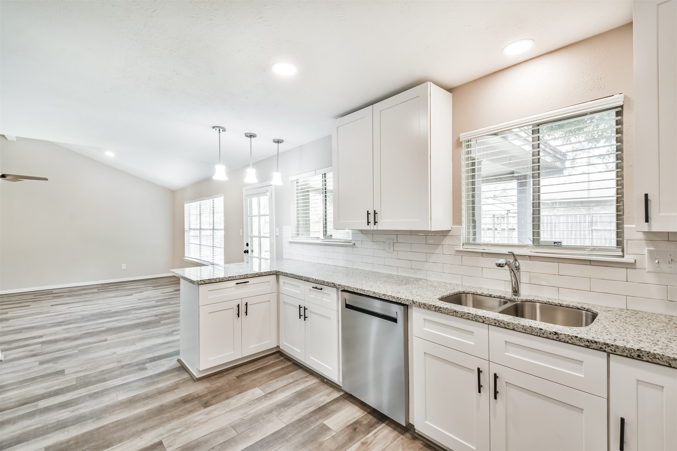 6103 Fallengate Drive Spring, TX 77373 - Photo 18 of 36 a kitchen with a sink cabinets and window