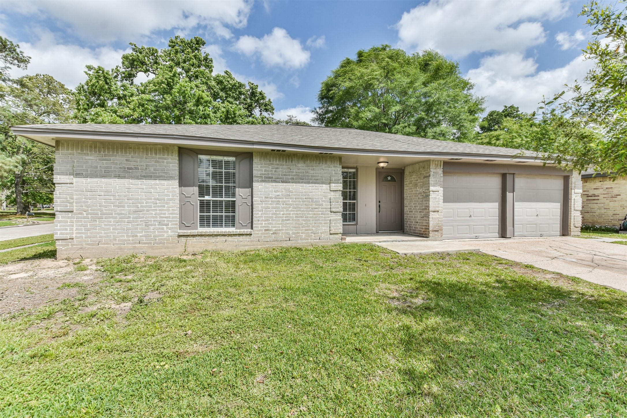 6103 Fallengate Drive Spring, TX 77373 - Photo 2 of 36 front view of a house with a yard