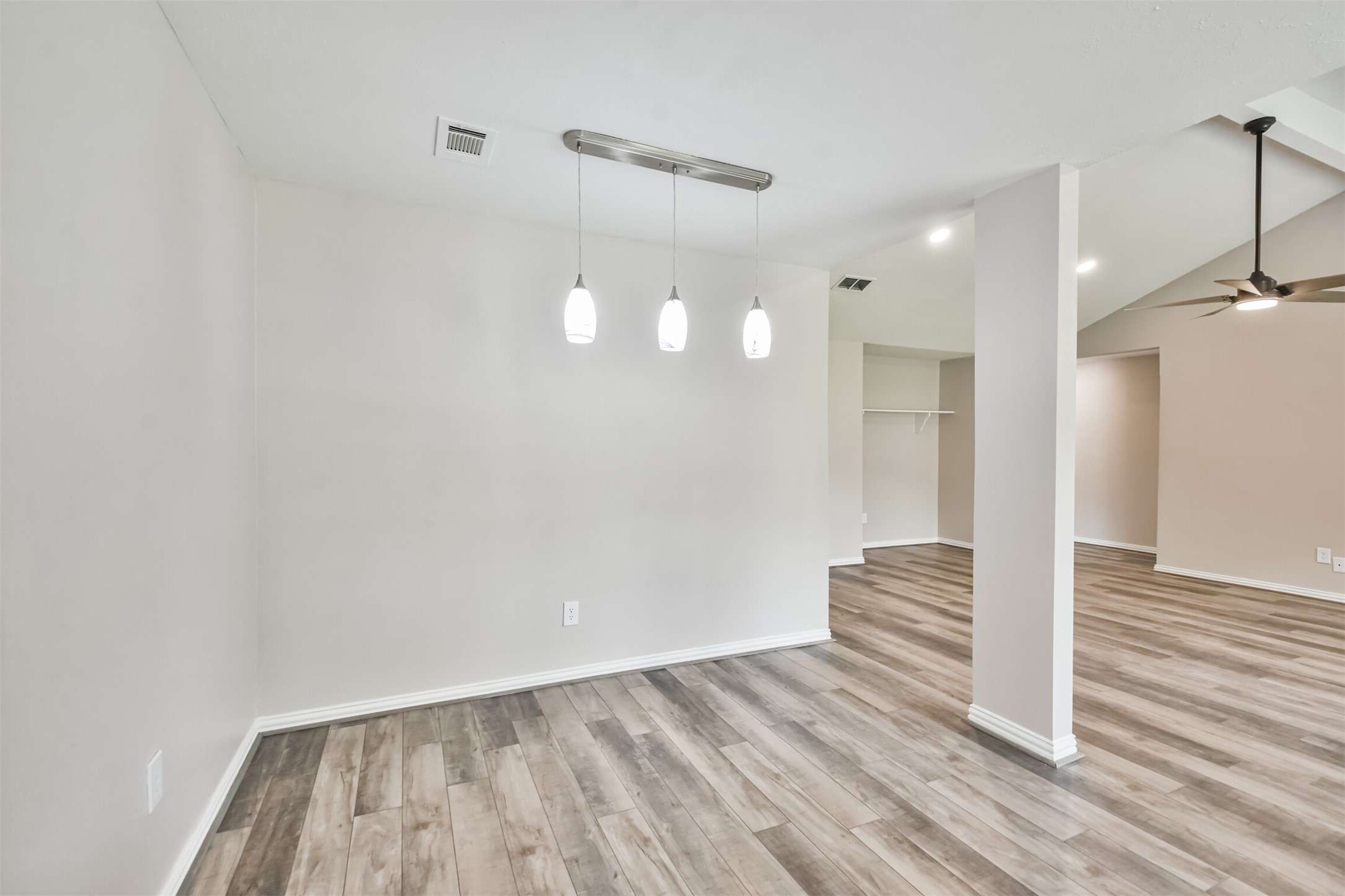 6103 Fallengate Drive Spring, TX 77373 - Photo 24 of 36 a view of a room with wooden floor and staircase