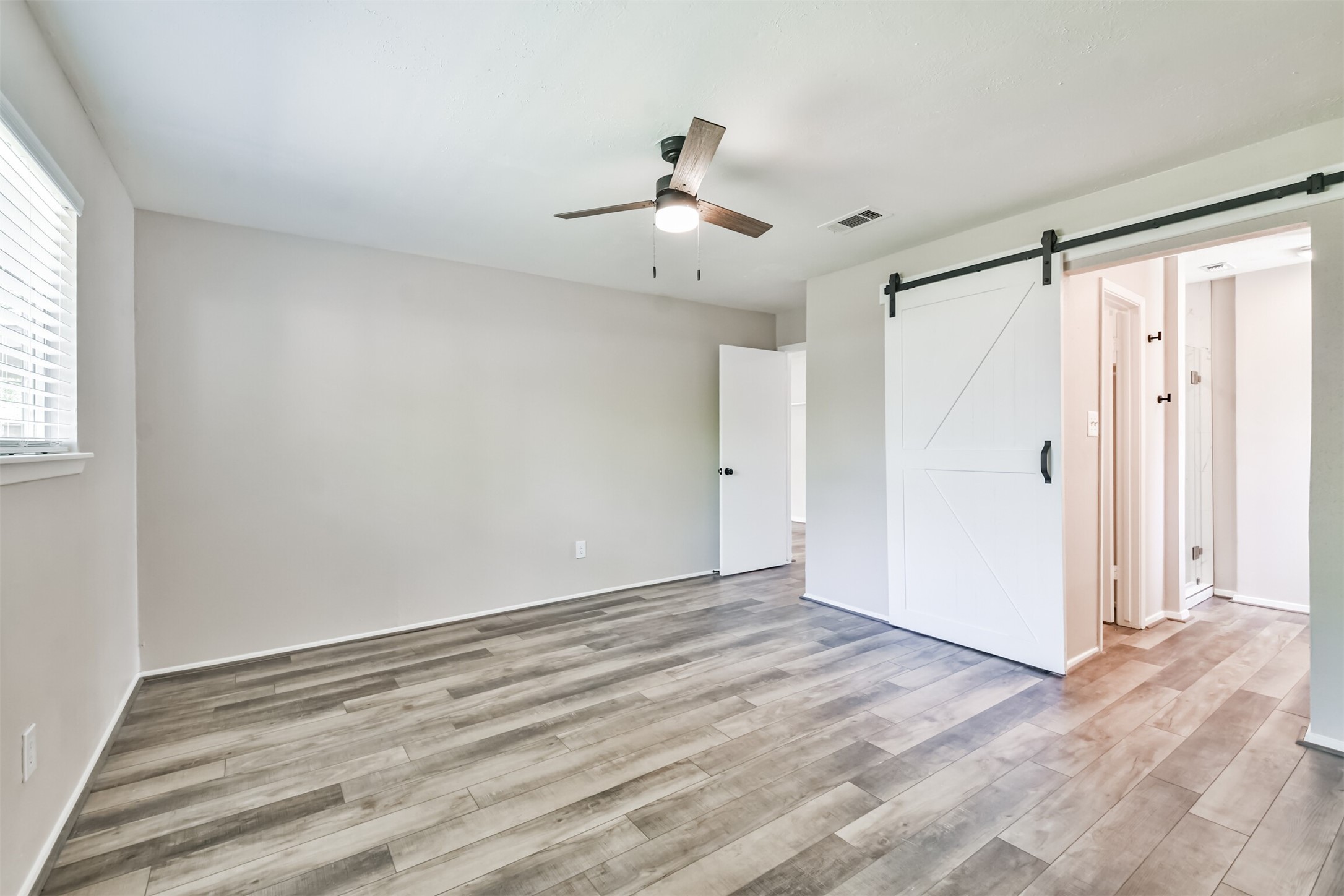 6103 Fallengate Drive Spring, TX 77373 - Photo 29 of 36 a view of an empty room with a window