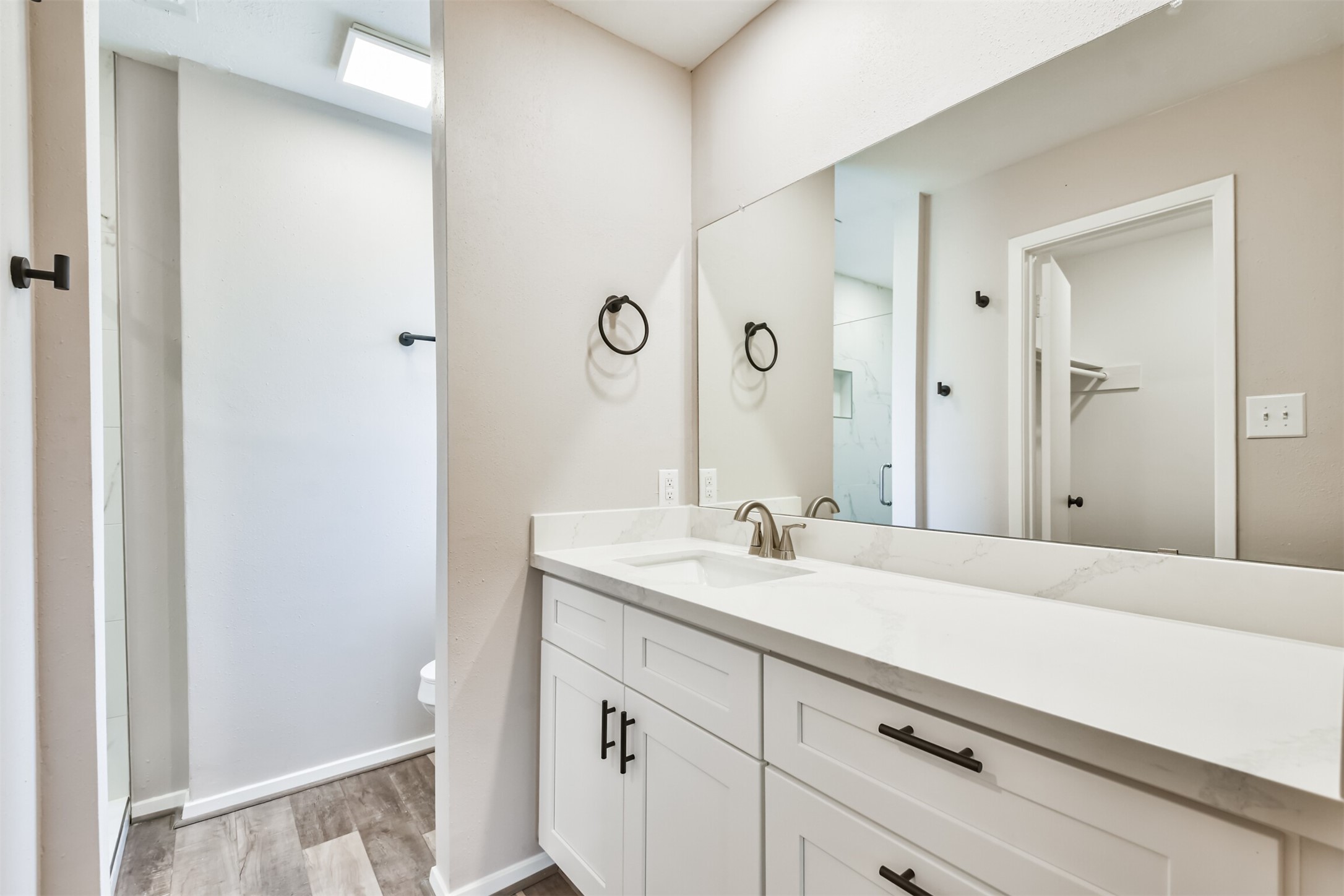 6103 Fallengate Drive Spring, TX 77373 - Photo 31 of 36 a bathroom with a sink and a mirror