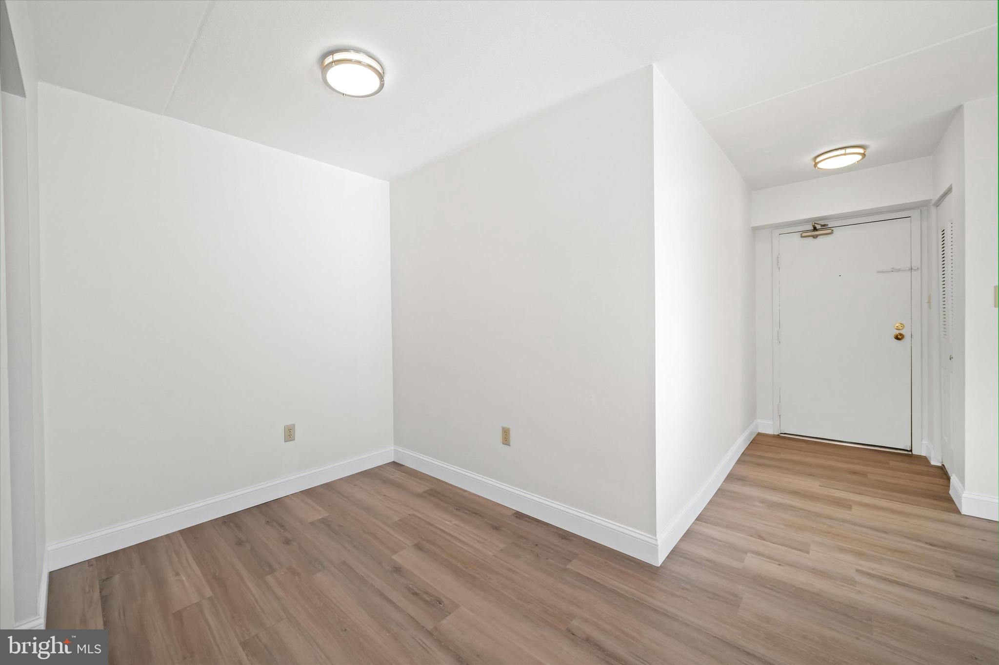 1 Berwyn Hall Dover, DE 19904 - Photo 9 of 16 a view of an empty room with wooden floor