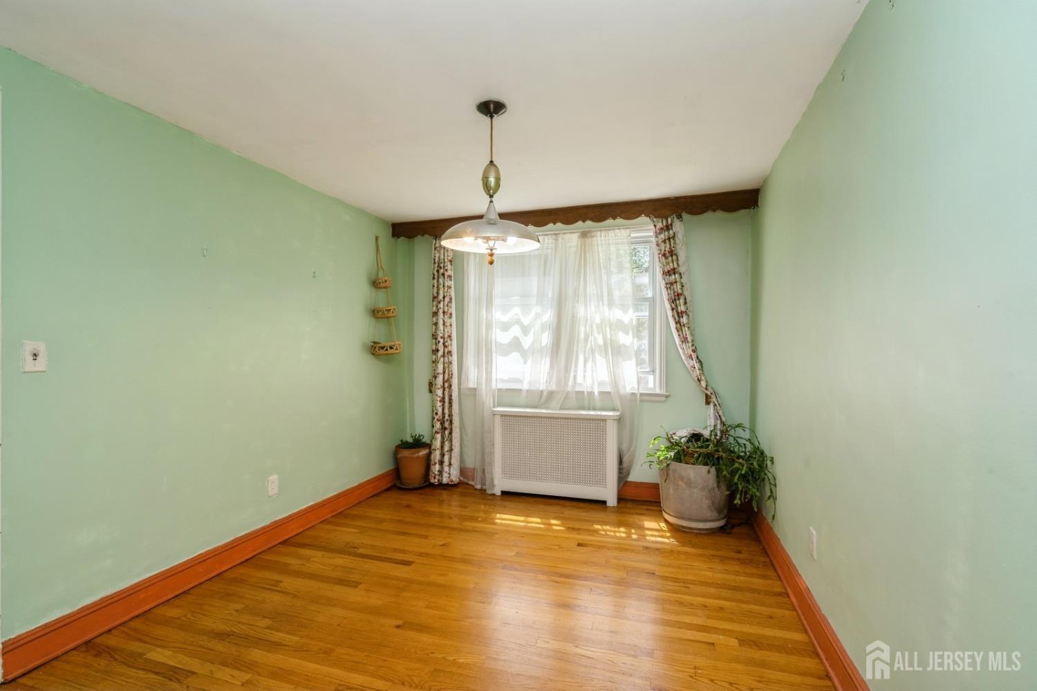 571 Greenbrook Road North Plainfield, NJ 07063 - Photo 12 of 28 a view of an empty room with a window