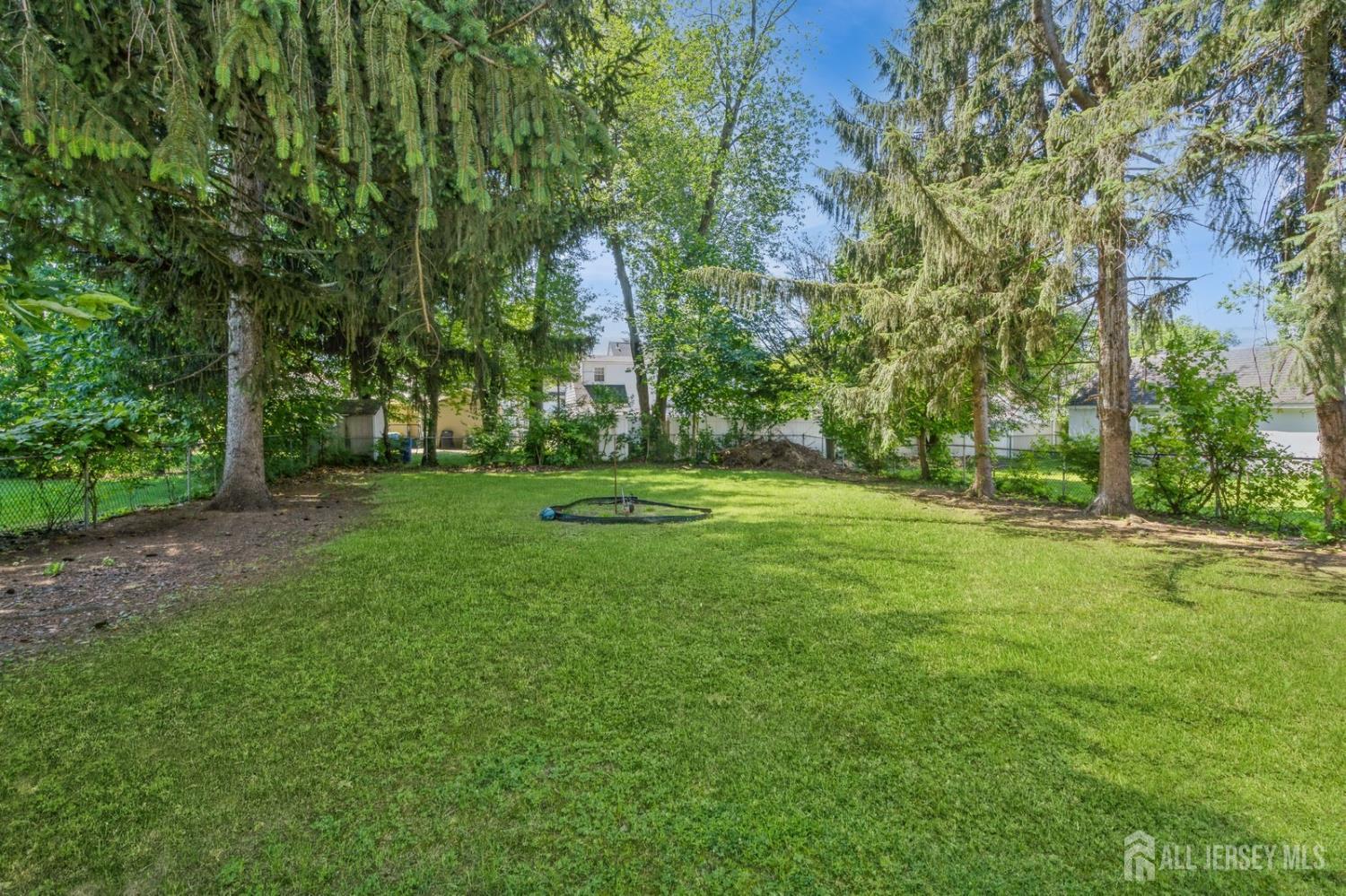 571 Greenbrook Road North Plainfield, NJ 07063 - Photo 4 of 28 a view of a park with large trees