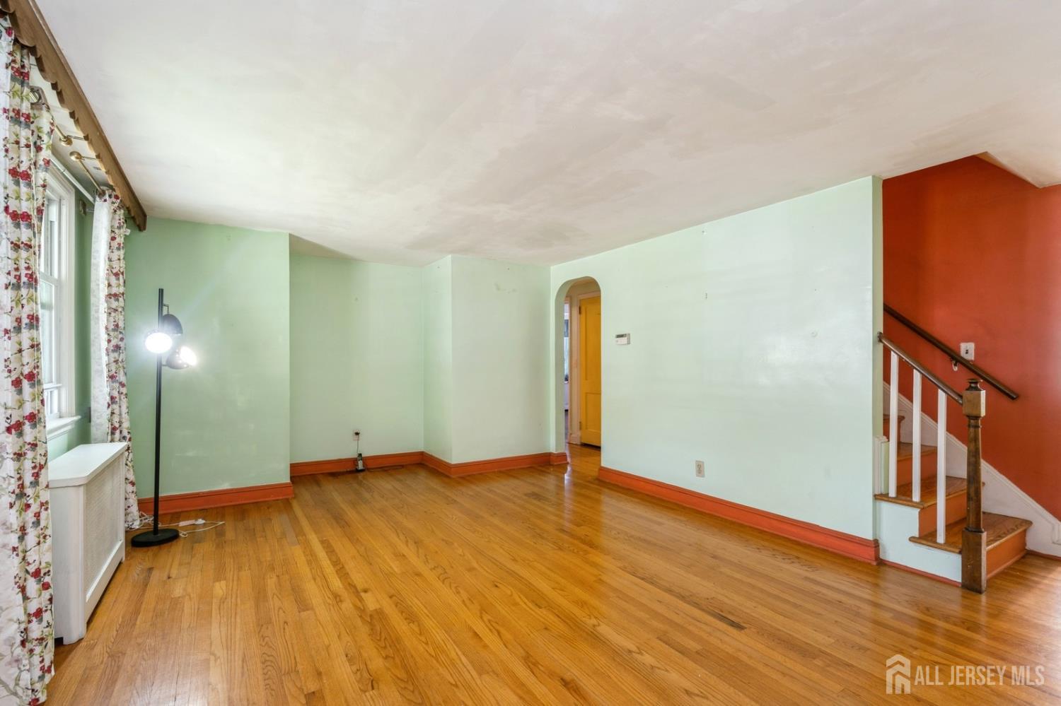 571 Greenbrook Road North Plainfield, NJ 07063 - Photo 10 of 28 a view of an empty room with wooden floor