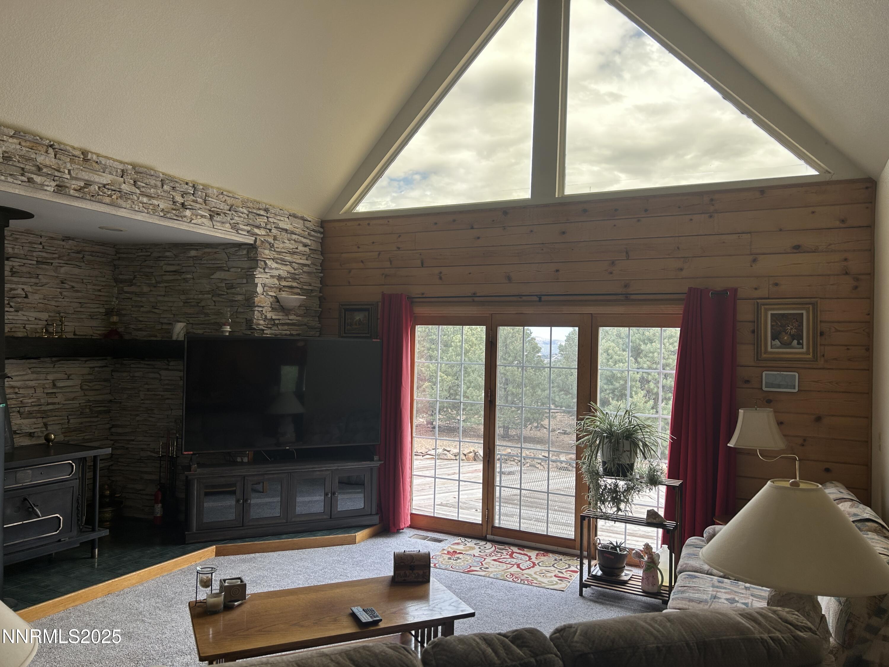 370 Panamint Road Reno, NV 89521 - Photo 5 of 8 a living room with furniture and a floor to ceiling window