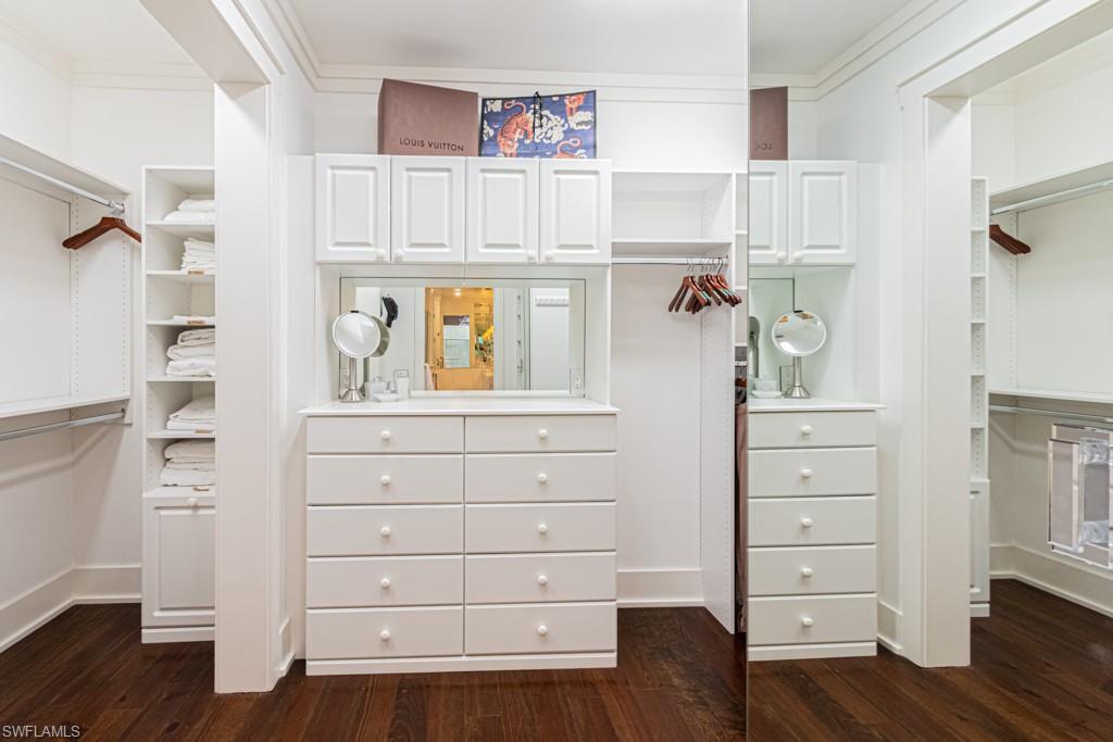 245 Broad Avenue South Naples, FL 34102 - Photo 33 of 50 a view of walk in closet and bedroom