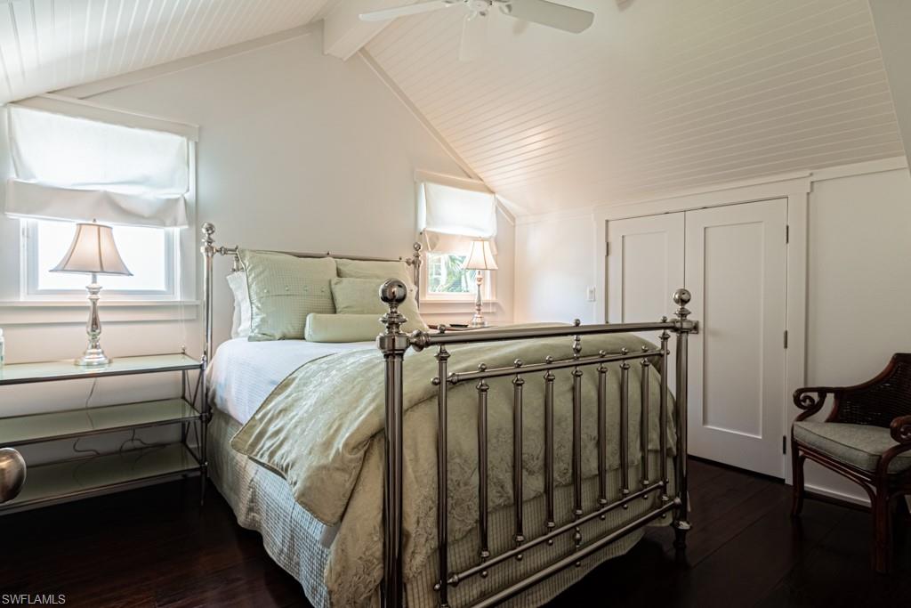 245 Broad Avenue South Naples, FL 34102 - Photo 37 of 50 a bedroom with a bed and a window