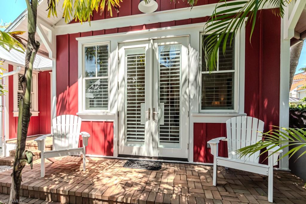 245 Broad Avenue South Naples, FL 34102 - Photo 43 of 50 a view of entryway with a outdoor seating