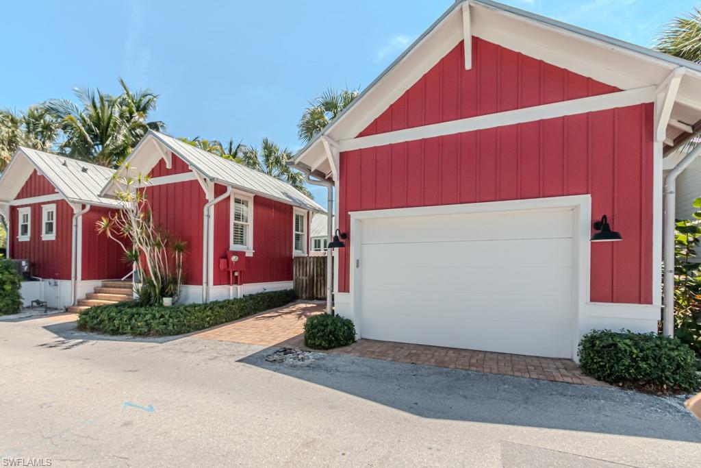 245 Broad Avenue South Naples, FL 34102 - Photo 50 of 50 a front view of house with yard