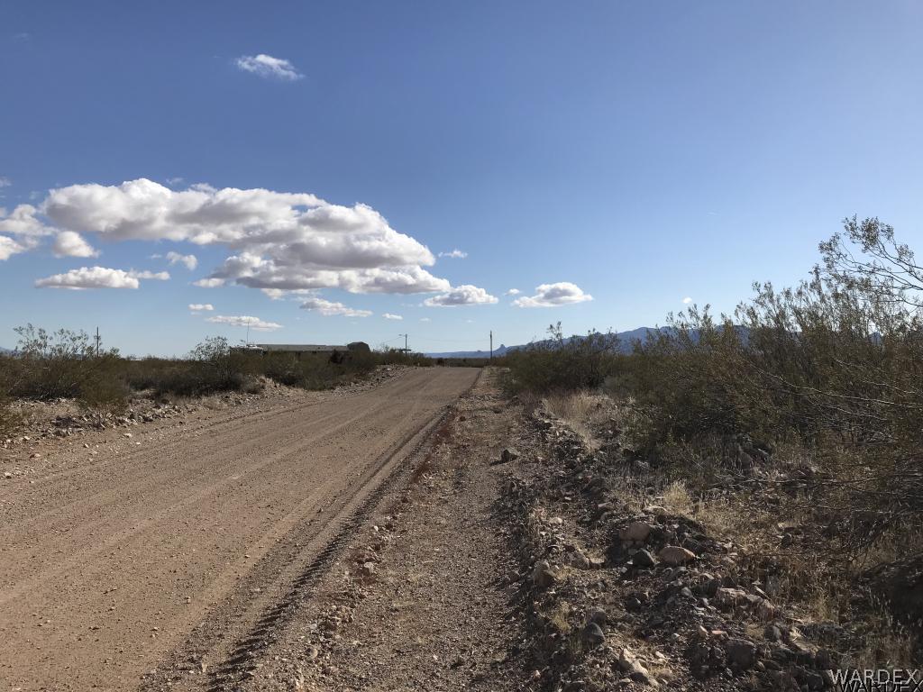 4606 Elgin Road Golden Valley, AZ 86413 - Photo 2 of 4 a view of a dry yard