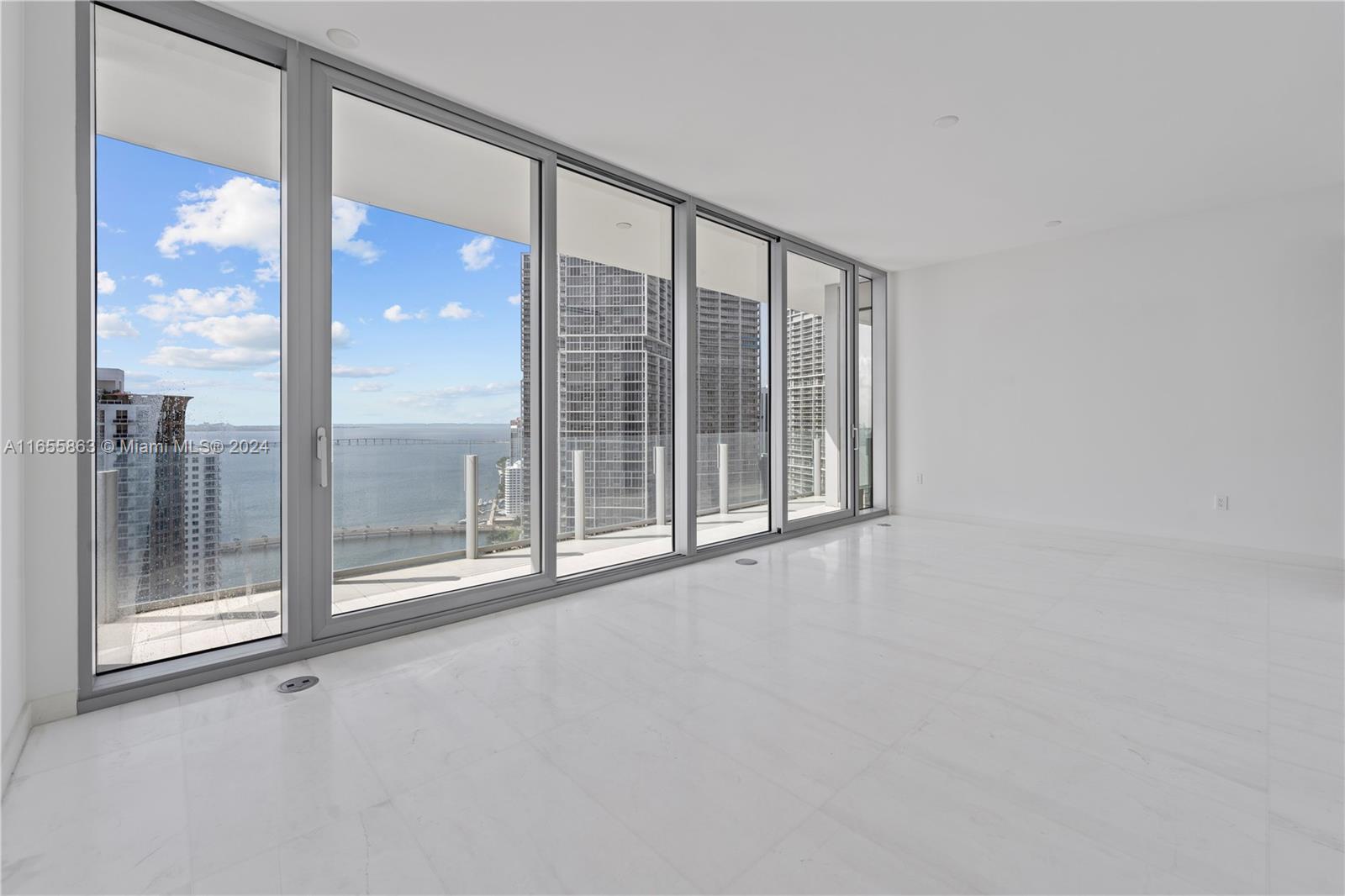 300 Biscayne Blvd Way, Unit 3201 Miami, FL 33131 - Photo 15 of 42 a view of an empty room with glass door