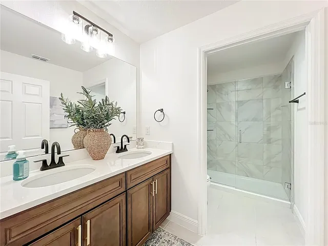 a view of a garage with a bike and car