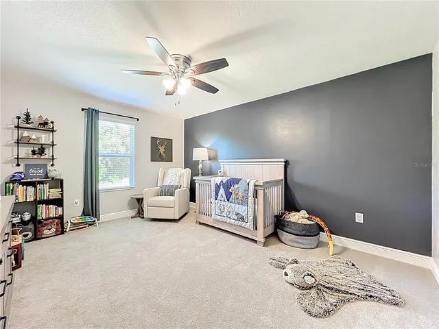 a view of a garage with a lot of stuff and toys