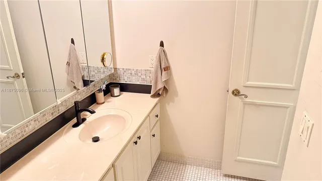 a view of a balcony with furniture and window