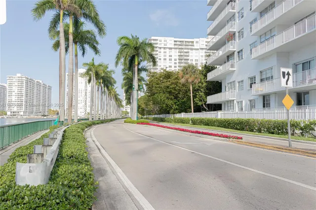 a view of street with flower plants