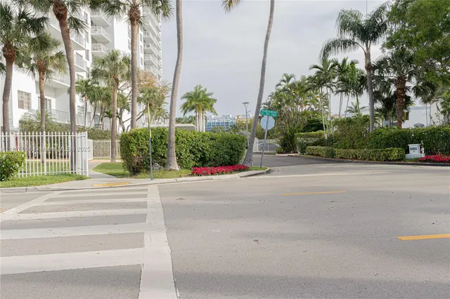 a front view of a building with garden