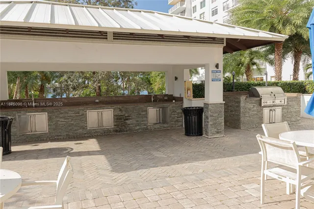 a view of a swimming pool and a yard