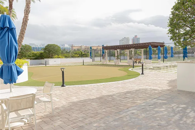 a building exterior with furniture