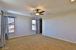 9265 East Canyon View Road Scottsdale, AZ 85255 - Photo 26 of 39 a view of an empty room with a window