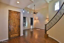 9265 East Canyon View Road Scottsdale, AZ 85255 - Photo 4 of 39 a view of an entryway with wooden floor