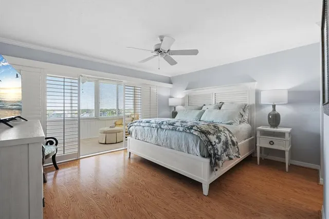 a bed room with a bed and a window