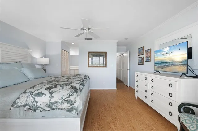 a bathroom with a sink vanity mirror and toilet