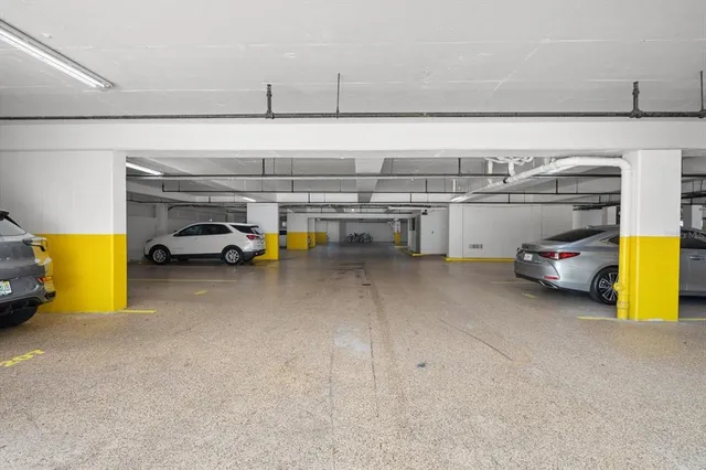 an aerial view of residential houses with outdoor space and swimming pool