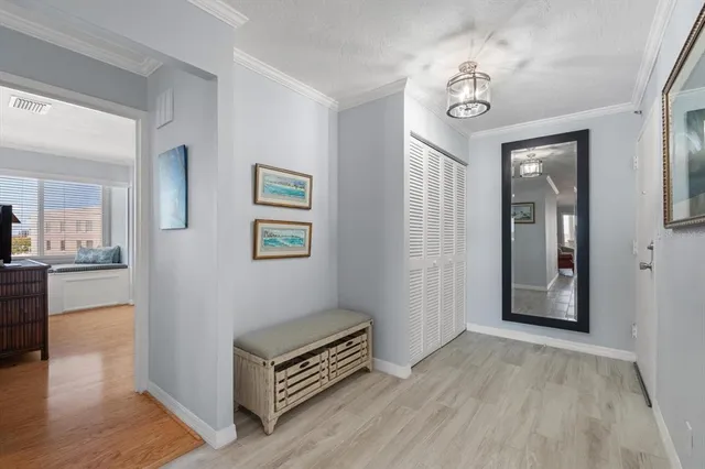 a kitchen with a stove top oven and cabinets